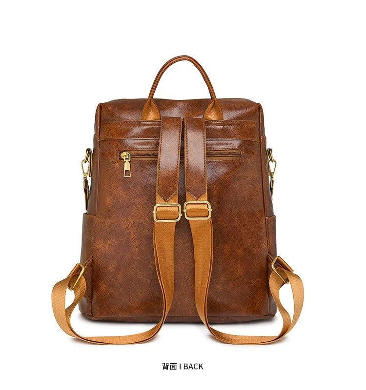 Pearl women's leather backpack tassel detail