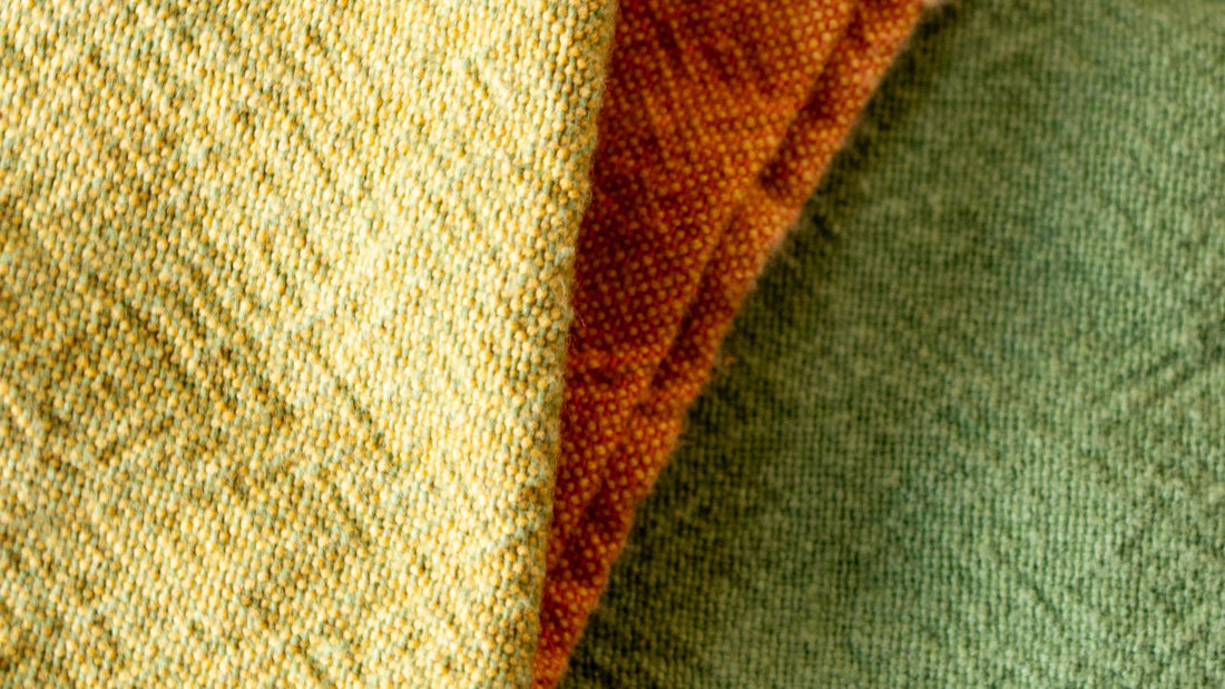 Close-up of textured fabric with visible stitching