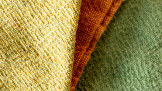 Close-up of textured fabric with visible stitching