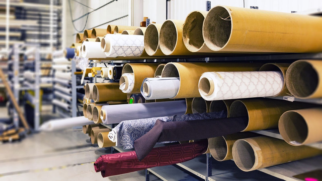 Rows of textile rolls stored in a manufacturing factory