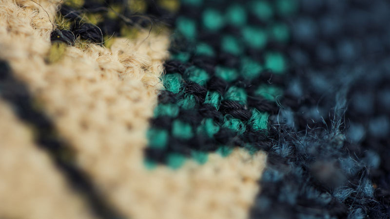 Close-up of woven technical fabric used in denier abrasion testing