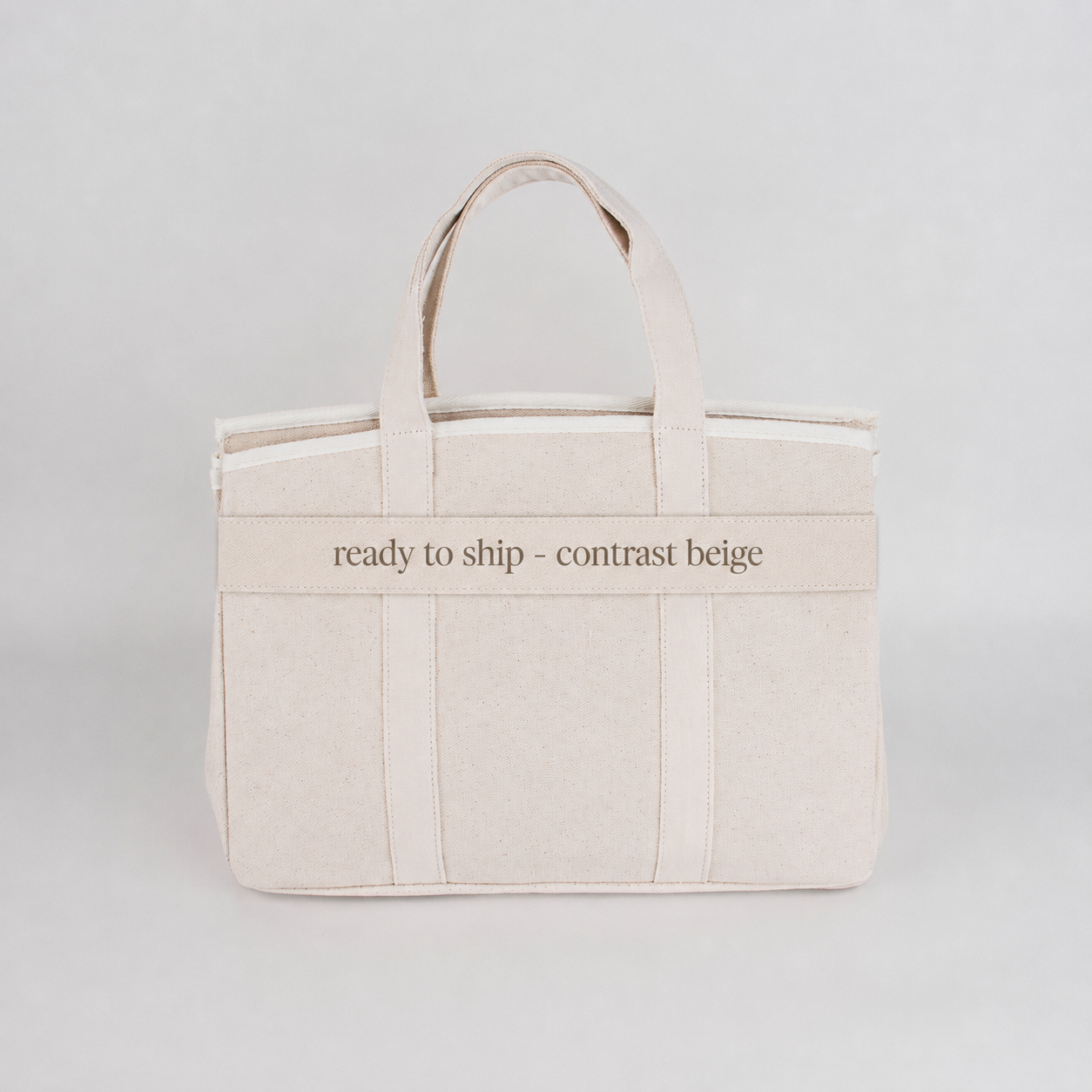 Backper Andromeda Gold-Buckle Structured Canvas Tote — Beige