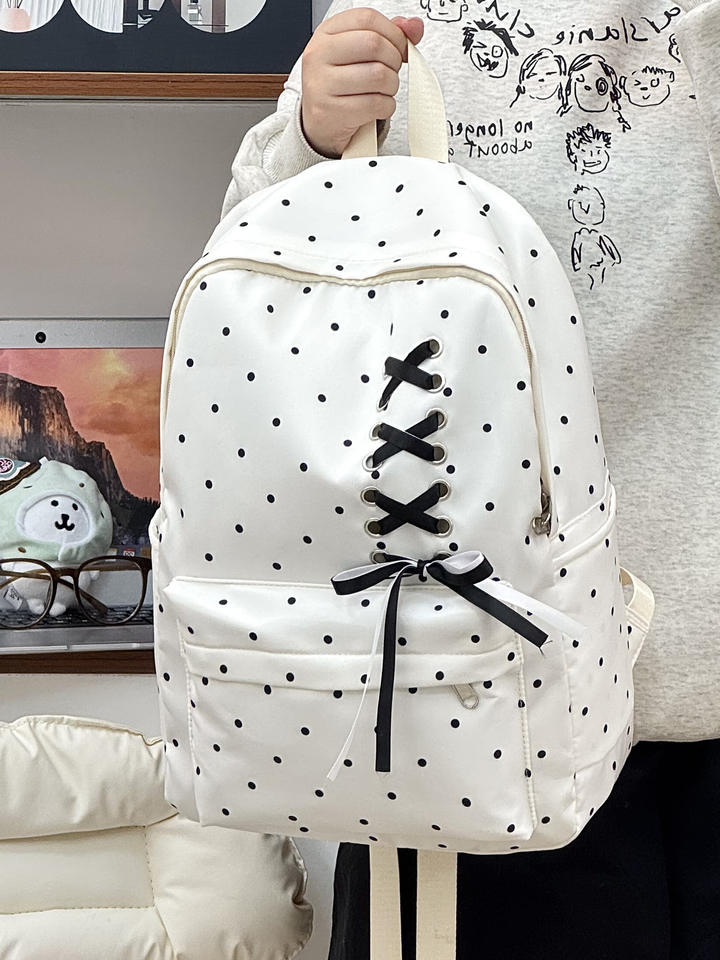 Obsidian SJ892929SCH bow polka dot backpack detail
